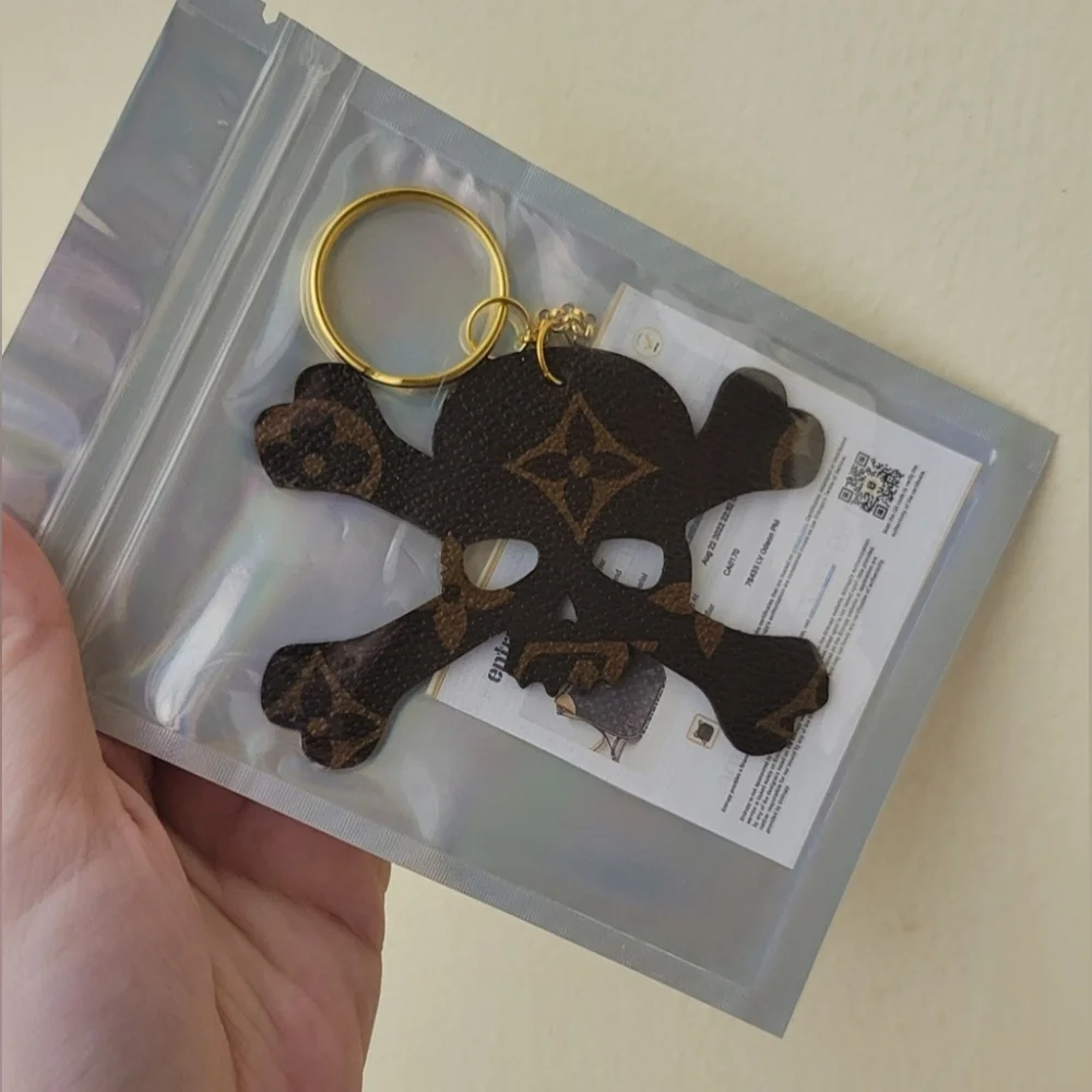 Luxury Bag Charm W/COA Skull & Crossbones